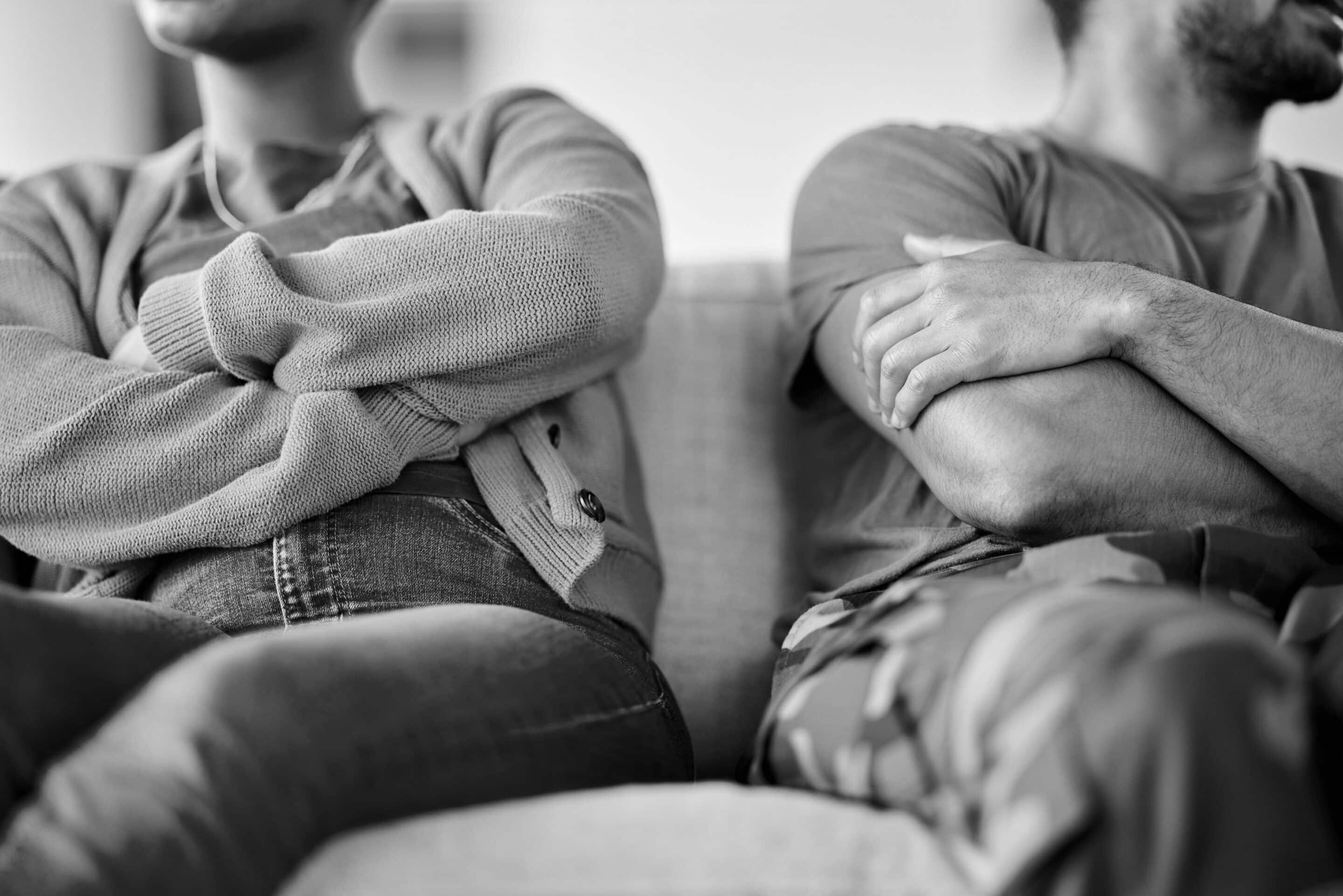 Fight, argument and couple on sofa in therapy for conflict, marriage problem and divorce counseling. Psychology, mental health and upset woman with military man or veteran for ptsd, issue and support